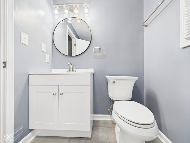 2126 Tartan Rd, Anderson, IN 46012 - bathroom with vanity and wood finished floors