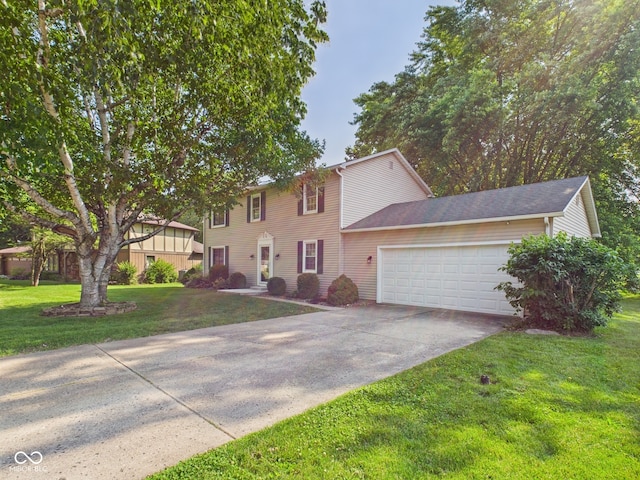 2126 Tartan Rd, Anderson, IN 46012 - colonial house featuring a garage, driveway, and a front yard