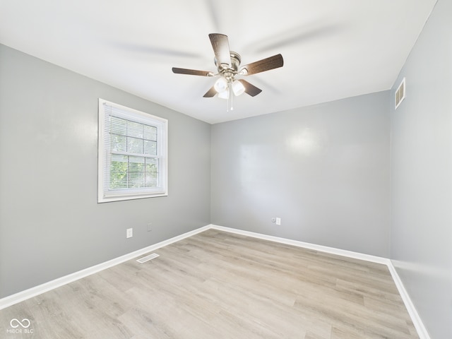2126 Tartan Rd, Anderson, IN 46012 - empty room with a ceiling fan and light wood-type flooring