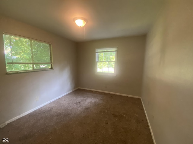 667 E Edgewood Ave, Indianapolis, IN 46227 - carpeted spare room with baseboards