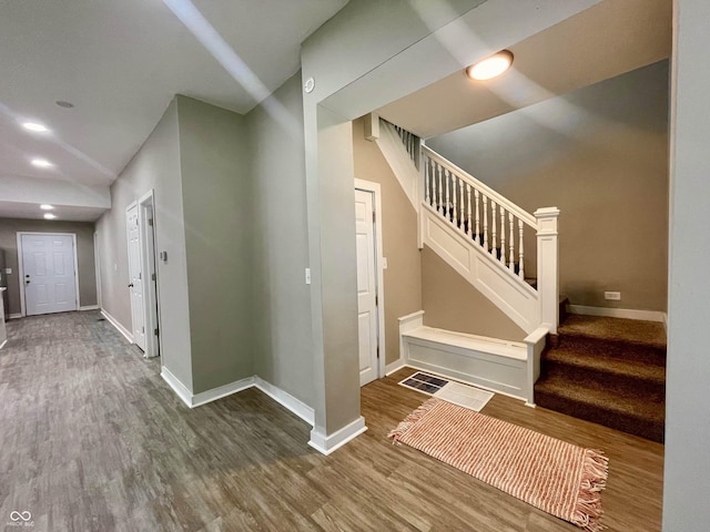 3835 N Kenwood Ave, Indianapolis, IN 46208 - stairway with wood finished floors, baseboards, and recessed lighting