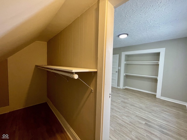 3835 N Kenwood Ave, Indianapolis, IN 46208 - spacious closet with wood finished floors and lofted ceiling