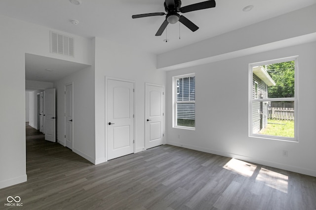 1409 N Grant Ave, Indianapolis, IN 46201 - spare room with wood finished floors and a ceiling fan