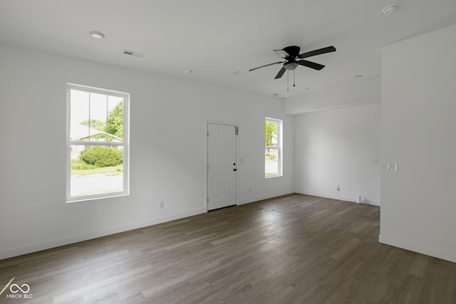 1409 N Grant Ave, Indianapolis, IN 46201 - spare room with wood finished floors, a smoke detector, and a ceiling fan