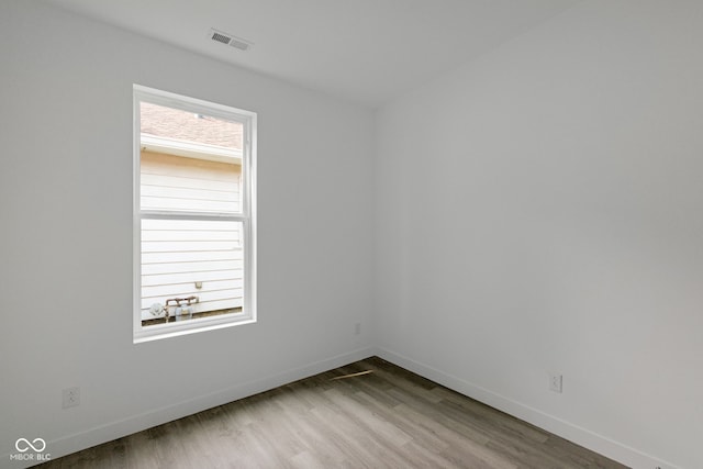 1409 N Grant Ave, Indianapolis, IN 46201 - unfurnished room with wood finished floors