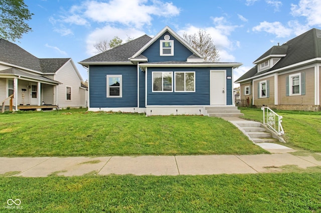 1020 N Courtland Ave, Kokomo, IN 46901 - bungalow-style home with a front lawn and a shingled roof