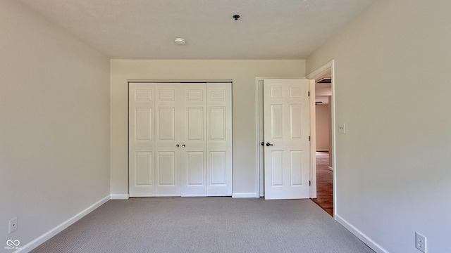 8176 Shorewalk Dr Unit C, Indianapolis, IN 46236 - unfurnished bedroom with carpet floors and a closet