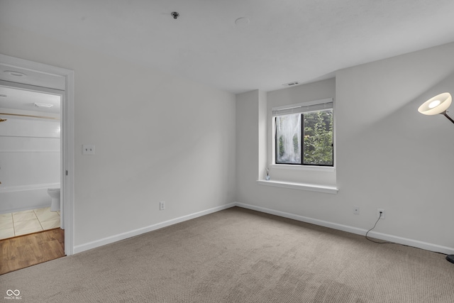 8176 Shorewalk Dr Unit C, Indianapolis, IN 46236 - spare room with carpet flooring and a pendent fire sprinkler