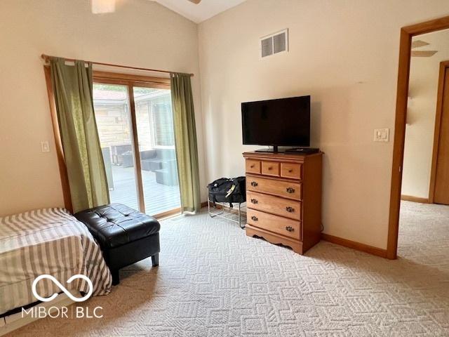 1802 Laurel Dr, Columbus, IN 47203 - bedroom with light colored carpet and access to exterior