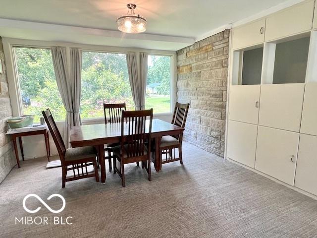 1802 Laurel Dr, Columbus, IN 47203 - dining room featuring healthy amount of natural light and light colored carpet