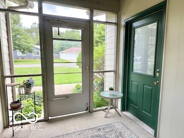 1802 Laurel Dr, Columbus, IN 47203 - doorway to outside with carpet