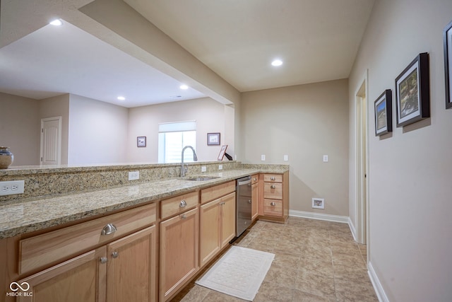 16209 Natures Way, Westfield, IN 46074 - kitchen with dishwasher, light stone counters, recessed lighting, and light brown cabinets