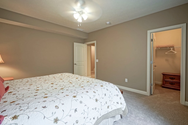 16209 Natures Way, Westfield, IN 46074 - bedroom featuring a walk in closet, carpet floors, a closet, and a ceiling fan