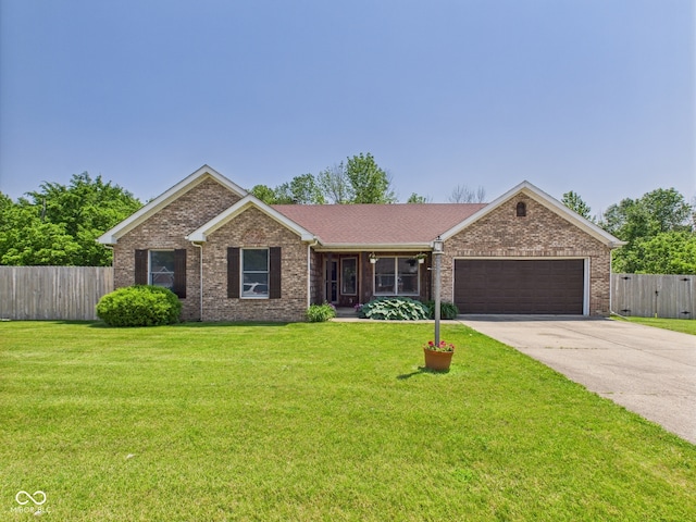 114 Bluebird Ln, Sulphur Springs, IN 47388 - ranch-style house with an attached garage, driveway, and brick siding