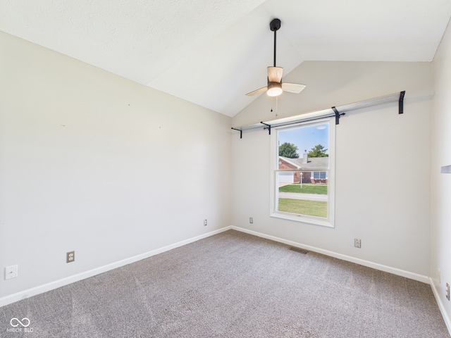 114 Bluebird Ln, Sulphur Springs, IN 47388 - carpeted empty room with ceiling fan, vaulted ceiling, and baseboards