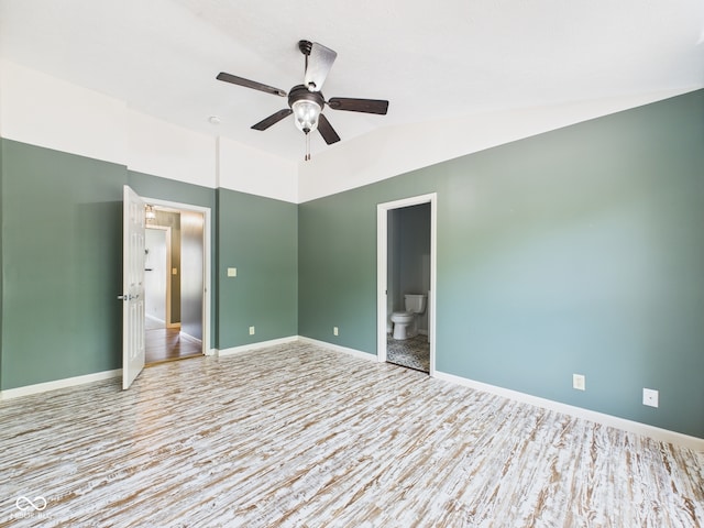 114 Bluebird Ln, Sulphur Springs, IN 47388 - empty room featuring wood finished floors, ceiling fan, lofted ceiling, and baseboards