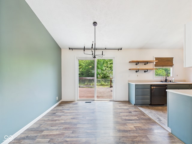 114 Bluebird Ln, Sulphur Springs, IN 47388 - kitchen with dishwasher, plenty of natural light, wood finished floors, and light countertops