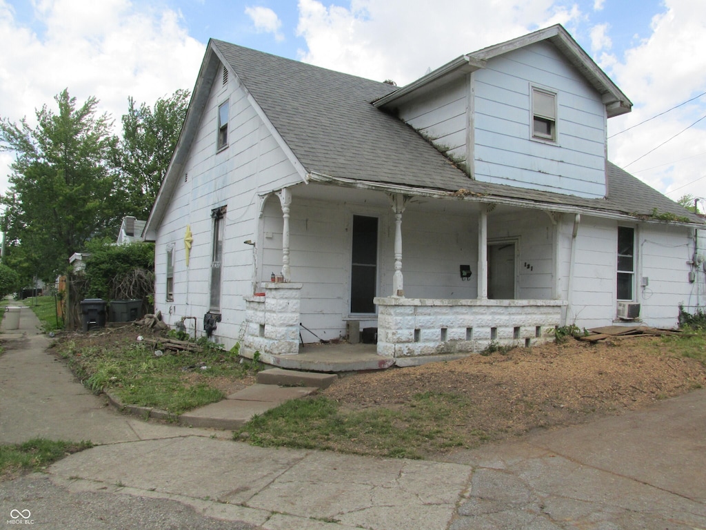 121 School St, Greenfield, IN 46140 - view of front of property featuring a porch and a shingled roof
