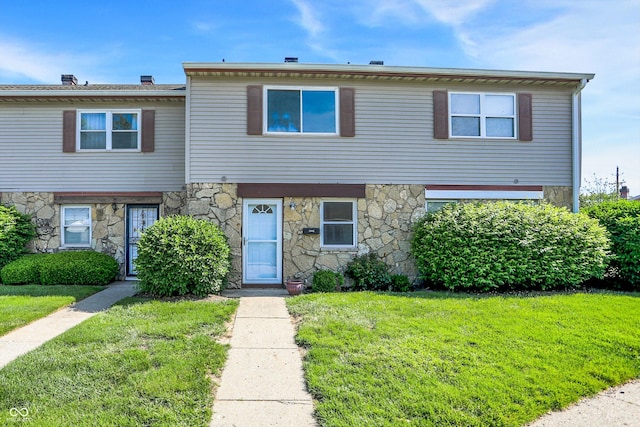 2642 Country Estates Dr, Indianapolis, IN 46227 - townhome / multi-family property with stone siding and a front lawn