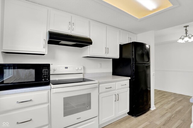 2642 Country Estates Dr, Indianapolis, IN 46227 - kitchen with black appliances, under cabinet range hood, light wood-type flooring, and white cabinetry