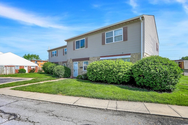 2642 Country Estates Dr, Indianapolis, IN 46227 - multi unit property with stone siding and a front lawn