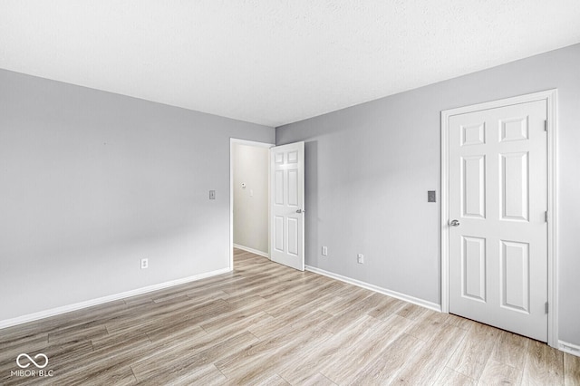 1044 Timber Creek Dr Unit 2, Carmel, IN 46032 - spare room featuring wood finished floors and baseboards