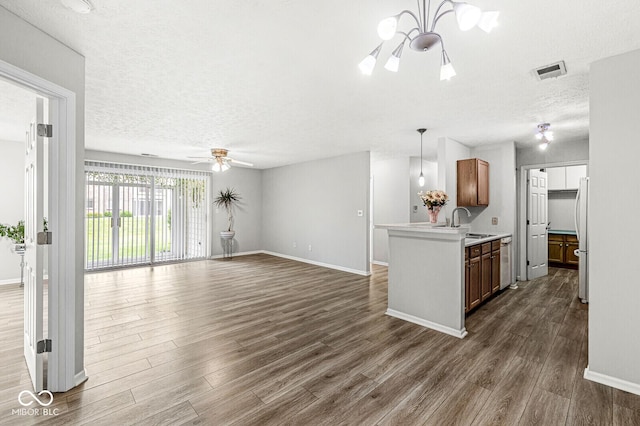 1044 Timber Creek Dr Unit 2, Carmel, IN 46032 - kitchen featuring freestanding refrigerator, ceiling fan, dark wood-style flooring, a textured ceiling, and open floor plan
