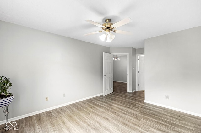 1044 Timber Creek Dr Unit 2, Carmel, IN 46032 - spare room with ceiling fan and light wood-type flooring
