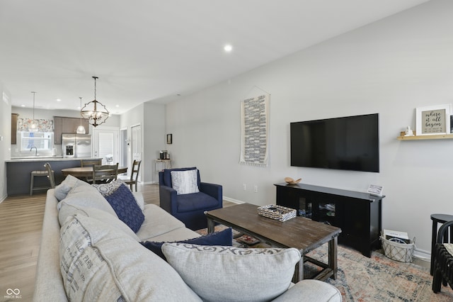3613 Lehigh Ave, Westfield, IN 46074 - living area featuring recessed lighting, light wood-style flooring, and a chandelier