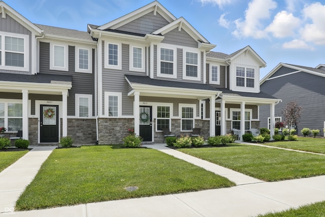3613 Lehigh Ave, Westfield, IN 46074 - craftsman-style home featuring a front lawn, a porch, stone siding, and board and batten siding