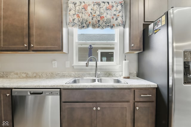3613 Lehigh Ave, Westfield, IN 46074 - kitchen featuring appliances with stainless steel finishes, dark brown cabinets, and light countertops