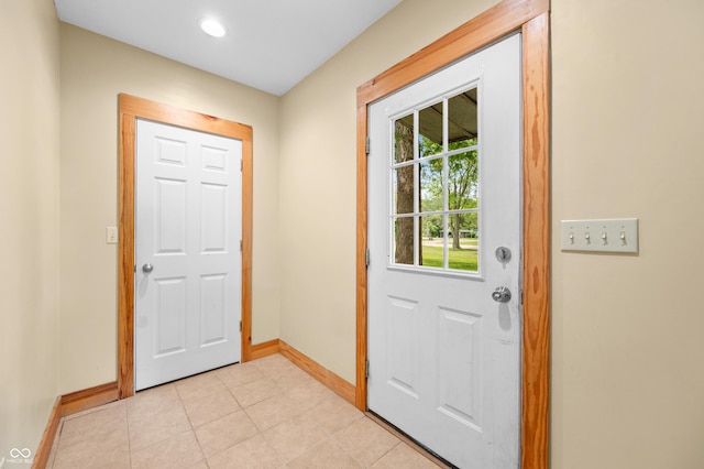 5800 S Shore Dr, Nashville, IN 47448 - doorway to outside with baseboards and light tile patterned flooring
