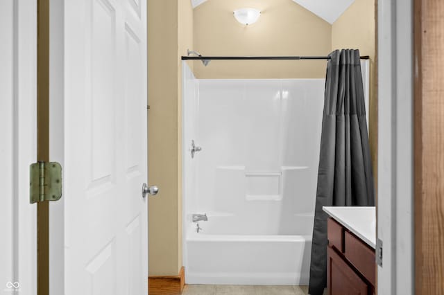 5800 S Shore Dr, Nashville, IN 47448 - full bathroom featuring vanity and shower / bathtub combination with curtain