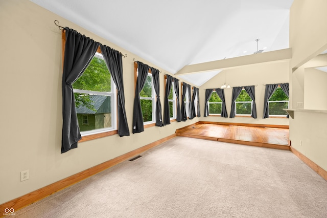 5800 S Shore Dr, Nashville, IN 47448 - spare room with lofted ceiling, carpet floors, wood finished floors, and a chandelier