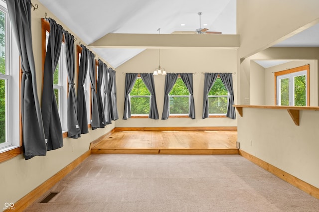 5800 S Shore Dr, Nashville, IN 47448 - corridor with carpet, lofted ceiling, and a chandelier