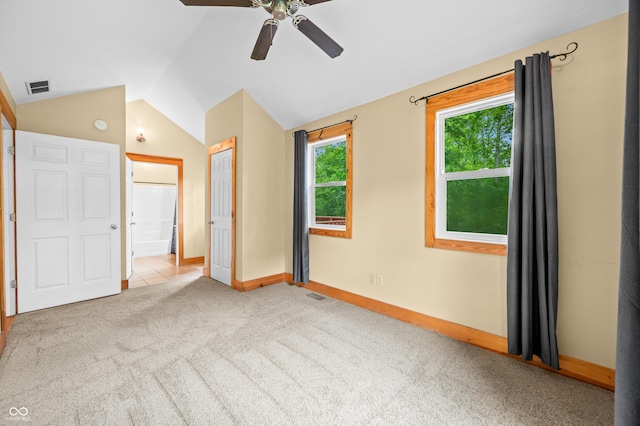 5800 S Shore Dr, Nashville, IN 47448 - unfurnished bedroom featuring vaulted ceiling, carpet flooring, connected bathroom, ceiling fan, and a closet