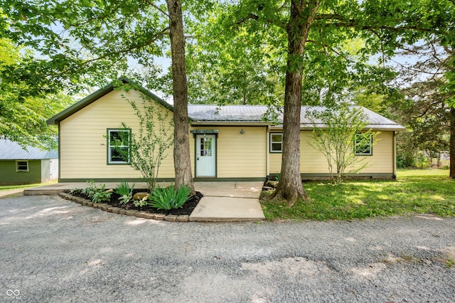 5800 S Shore Dr, Nashville, IN 47448 - ranch-style house with a metal roof