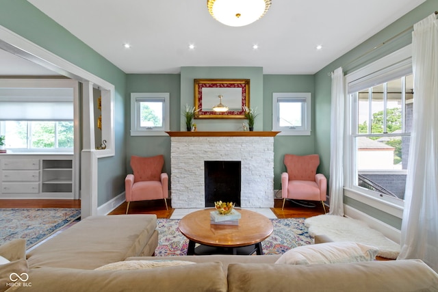4813 E 11th St, Indianapolis, IN 46201 - living area with wood finished floors and a fireplace