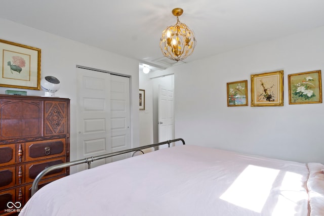 4813 E 11th St, Indianapolis, IN 46201 - bedroom with a closet and a chandelier