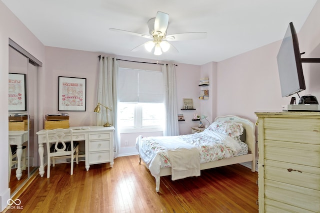 4813 E 11th St, Indianapolis, IN 46201 - bedroom featuring hardwood / wood-style floors, ceiling fan, and a closet