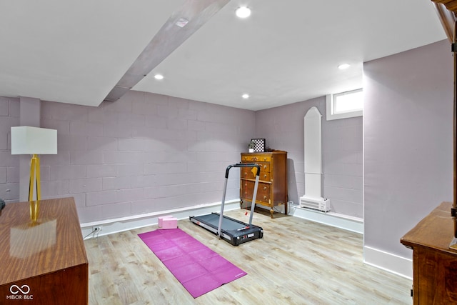 4813 E 11th St, Indianapolis, IN 46201 - exercise room featuring wood finished floors, concrete block wall, and recessed lighting