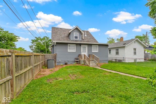 4813 E 11th St, Indianapolis, IN 46201 - rear view of house with a fenced backyard