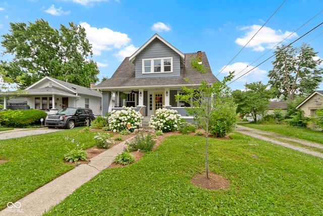 4813 E 11th St, Indianapolis, IN 46201 - bungalow-style house with a front yard and a porch