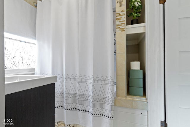 4813 E 11th St, Indianapolis, IN 46201 - bathroom with vanity and a shower with curtain
