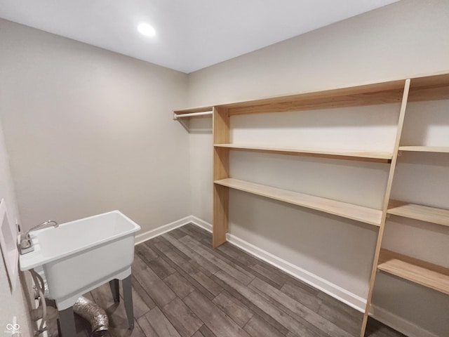 1359 Shadow Ridge Rd, Indianapolis, IN 46280 - laundry area with dark wood-type flooring and recessed lighting