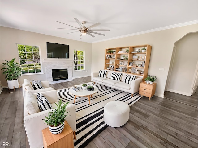 1359 Shadow Ridge Rd, Indianapolis, IN 46280 - living room featuring ceiling fan, wood finished floors, baseboards, a fireplace with flush hearth, and ornamental molding