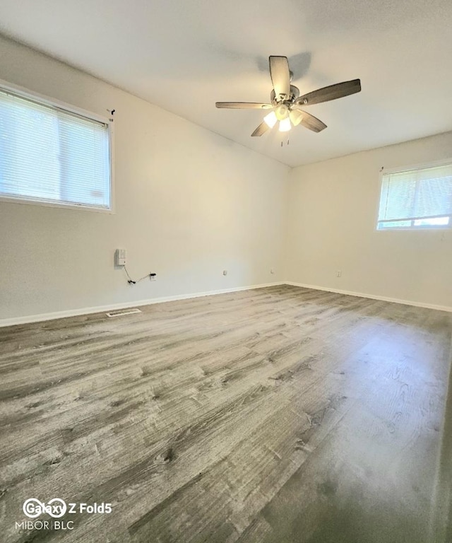 731 Sunset Blvd, Greenwood, IN 46142 - empty room with baseboards, wood finished floors, and a ceiling fan