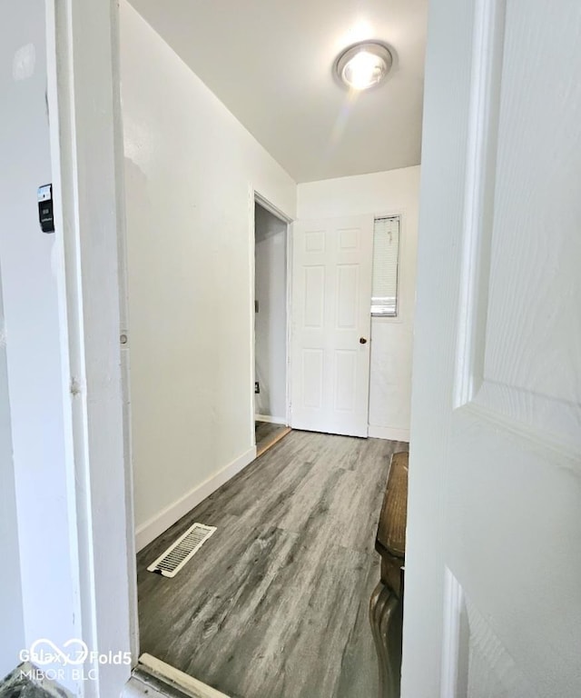 731 Sunset Blvd, Greenwood, IN 46142 - hall with wood finished floors and baseboards