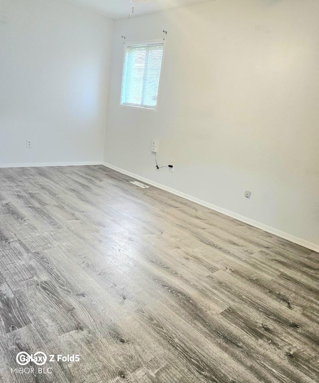 731 Sunset Blvd, Greenwood, IN 46142 - unfurnished room with baseboards and wood finished floors