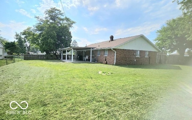 731 Sunset Blvd, Greenwood, IN 46142 - back of house with brick siding and a patio